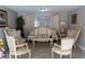 Beautiful living room with ornate furniture, neutral walls, and tile floors at 9116 Gray Fox Ln, Port Richey, FL 34668
