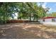 Sizeable backyard with mature trees, with plenty of room for recreation and outdoor enjoyment at 9306 21St, Tampa, FL 33612