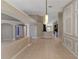 Spacious living room featuring tile flooring, and neutral wall color and trim at 9729 Bay Colony Dr, Riverview, FL 33578
