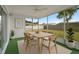 Bright sunroom with tons of natural light and view of the backyard at 9744 Rainelle Ln, Port Richey, FL 34668