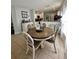 Inviting dining area adjacent to the kitchen, perfect for everyday meals and entertaining guests at 9808 Riverchase Dr, New Port Richey, FL 34655