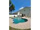 The private pool includes large deck, providing an ideal space for outdoor entertaining or relaxation at 9808 Riverchase Dr, New Port Richey, FL 34655