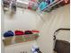 Walk-in closet with wire shelving for clothing, boxes, and other personal items at 10181 Holly Berry Dr, Weeki Wachee, FL 34613