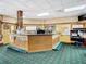 Inviting clubhouse desk area showcases golf clubs, offering a warm greeting at 10181 Holly Berry Dr, Weeki Wachee, FL 34613
