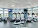Gym with various fitness equipment and large windows offering scenic views at 10181 Holly Berry Dr, Weeki Wachee, FL 34613