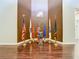Interior view of flags and statue displayed on hardwood flooring and neutral walls at 10181 Holly Berry Dr, Weeki Wachee, FL 34613