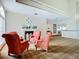 Cozy sitting area with comfortable seating around a fireplace, perfect for relaxing and socializing with guests at 10181 Holly Berry Dr, Weeki Wachee, FL 34613