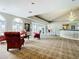 Spacious lobby featuring elegant furniture, chandelier lighting and an open layout at 10181 Holly Berry Dr, Weeki Wachee, FL 34613