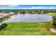 Scenic view of the pond showcasing the beautiful surroundings and serene setting at 10181 Holly Berry Dr, Weeki Wachee, FL 34613