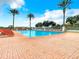 Inviting swimming pool area with lounge chairs and clear blue water, perfect for relaxation and leisure in the community at 10181 Holly Berry Dr, Weeki Wachee, FL 34613