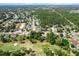 A scenic aerial view showcases a residential area adjacent to a lush green golf course at 10267 Elgin Blvd, Spring Hill, FL 34608