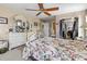 Well-lit bedroom with ensuite bathroom, vanity and closet at 10267 Elgin Blvd, Spring Hill, FL 34608