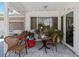 Cozy patio with seating, planters, and a view of the backyard, perfect for outdoor relaxation at 10267 Elgin Blvd, Spring Hill, FL 34608