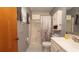Clean bathroom with walk-in shower, modern vanity, and plenty of natural light at 10386 Myra St, Spring Hill, FL 34608