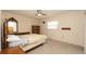 Charming bedroom with soft carpet, natural light, and warm ambiance at 10386 Myra St, Spring Hill, FL 34608