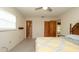 Inviting bedroom featuring soft carpet, natural light, and warm ambiance at 10386 Myra St, Spring Hill, FL 34608