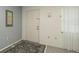 The entryway features neutral walls and flooring with a patterned rug and natural light at 10386 Myra St, Spring Hill, FL 34608