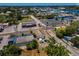 Aerial view of commercial businesses located on the water and surrounded by roadways at 111 E Cedar St, Tarpon Springs, FL 34689