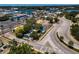 Aerial view of commercial properties near the water with bridge access and roadways at 111 E Cedar St, Tarpon Springs, FL 34689
