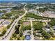 Aerial view showcasing the property's location near natural water features and local amenities at 111 E Cedar St, Tarpon Springs, FL 34689