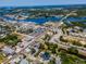 A high-definition aerial shot of the home's location, with city, harbor, and neighborhood features visible at 111 E Cedar St, Tarpon Springs, FL 34689