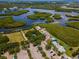 Panoramic aerial view of waterfront community featuring lush green spaces at 111 E Cedar St, Tarpon Springs, FL 34689