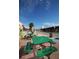 Vibrant street view with colorful buildings, sidewalk seating, and a charming, walkable atmosphere at 111 E Cedar St, Tarpon Springs, FL 34689