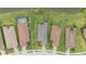 Aerial view of backyard homes with pools and lush green landscaping at 11398 Juglans Dr, Odessa, FL 33556