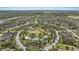 Aerial view of the neighborhood's community park with pool, playground, and open green space at 11398 Juglans Dr, Odessa, FL 33556