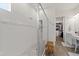 Modern main bathroom with a glass-enclosed shower, tile walls, and a built-in bench at 11398 Juglans Dr, Odessa, FL 33556