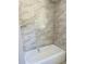 Bathroom features new tile around the tub at 11406 Labrador Duck Rd, Weeki Wachee, FL 34614