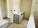 Bathroom features a vanity with drawers and counter top at 11406 Labrador Duck Rd, Weeki Wachee, FL 34614