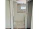 Bathroom featuring ceramic tile and a window at 11406 Labrador Duck Rd, Weeki Wachee, FL 34614