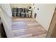 Laundry area featuring modern flooring, with paint supplies ready for finishing touches at 11406 Labrador Duck Rd, Weeki Wachee, FL 34614