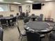The game room offers poker tables and seating for friendly competitions at 11619 Boynton Ln, New Port Richey, FL 34654