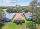 Aerial shot of backyard and pool area, with screened in patio at 11752 Wheatfield Loop, Hudson, FL 34667