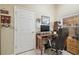 Office space with a wooden desk and neutral wall color at 11752 Wheatfield Loop, Hudson, FL 34667