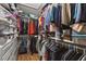 Walk-in closet features custom shelving at 11752 Wheatfield Loop, Hudson, FL 34667