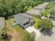 Aerial view of home showing fenced backyard, landscaped yard, and convenient access to community at 12055 Colony Lakes Blvd, New Port Richey, FL 34654