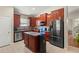 Spacious kitchen featuring an island, stainless steel appliances, and lots of cabinet storage at 12055 Colony Lakes Blvd, New Port Richey, FL 34654