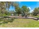 Neighborhood playground with swings, slide, and play equipment at 12055 Colony Lakes Blvd, New Port Richey, FL 34654