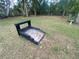 Backyard horseshoe set, ready for hours of outdoor fun at 12090 Stoneville Ct, Spring Hill, FL 34609