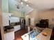 Bright kitchen with stainless steel appliances, island with seating, and ample cabinet space at 12090 Stoneville Ct, Spring Hill, FL 34609