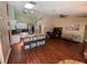 Open kitchen with island seating, seamlessly connecting to the living and dining areas at 12090 Stoneville Ct, Spring Hill, FL 34609