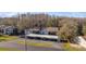 Aerial view showcases the community's layout, featuring carports, landscaping, and building exteriors at 12155 Environmental Dr # 8, New Port Richey, FL 34654