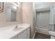 Bathroom featuring a vanity with a mirror, drawers, a toilet, and a shower with curtain at 12155 Environmental Dr # 8, New Port Richey, FL 34654