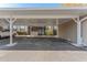 Carport parking with assigned spaces in front of building at 12155 Environmental Dr # 8, New Port Richey, FL 34654