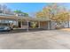 View of the convenient carport with assigned parking spaces for the townhome residences at 12155 Environmental Dr # 8, New Port Richey, FL 34654