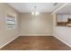 Dining room features laminate flooring and natural light at 12155 Environmental Dr # 8, New Port Richey, FL 34654