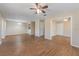Spacious living room featuring laminate flooring and neutral walls at 12155 Environmental Dr # 8, New Port Richey, FL 34654